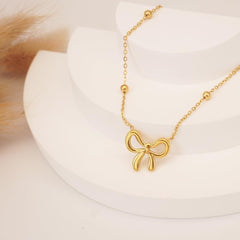 Elegant Bow Necklace for Women – Gold & Silver Ribbon Pendant Chain Jewelry