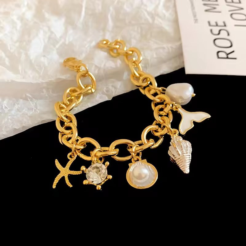 Starfish & Shell Charm Ocean Bracelet – Elegant Beach-Inspired Jewelry