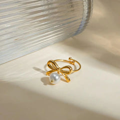 Bow style ring with pearl