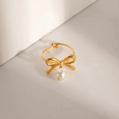 Bow style ring with pearl